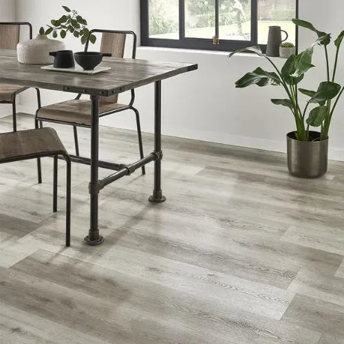 Piso vinilico con manta gris veteado